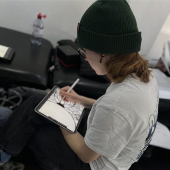 A student working on a design at Blackout Tattoo & Piercing Academy in Middlesbrough.