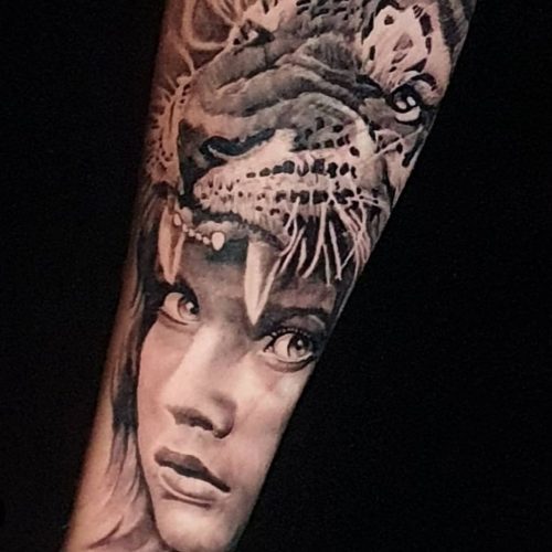 Lion and face realism tattoo design.