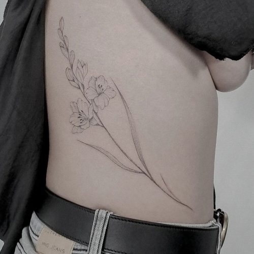 Fine Line Flower Tattoo Design.