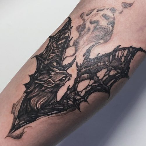 Black bat tattoo