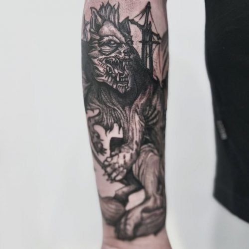 Creepy blackwork tattoo