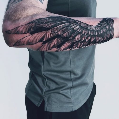 Wing Blackwork Tattoo on Forearm