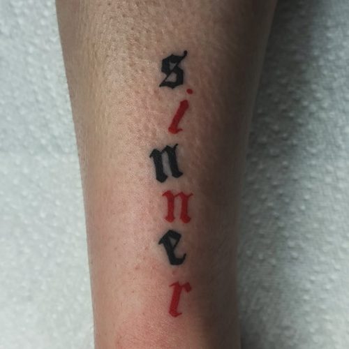 Sinner script tattoo