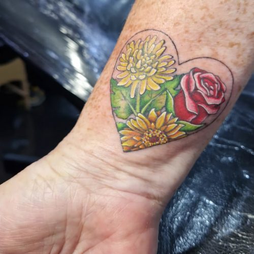Colourful flower tattoos.