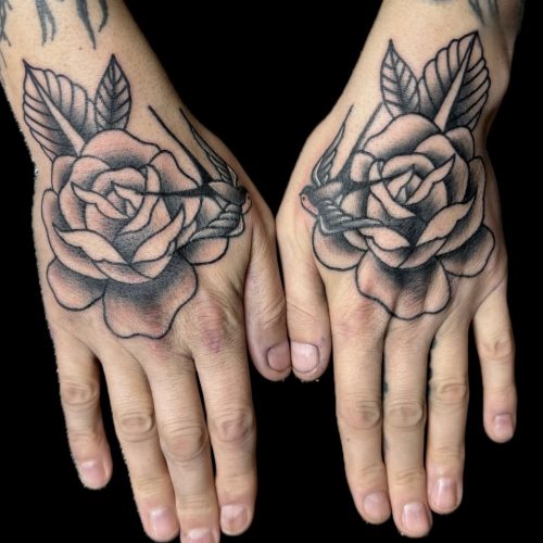 Trad roses on hands