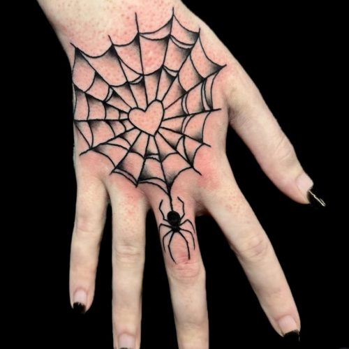 Spider web trad tattoo