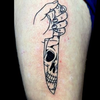 Traditional knife tattoo