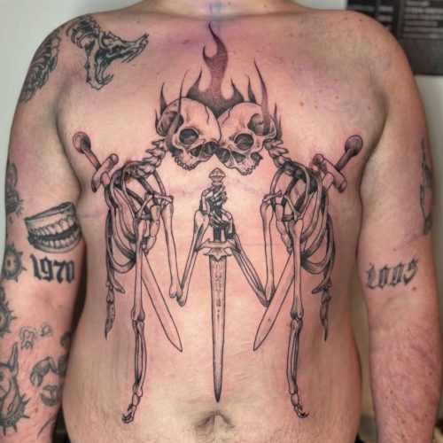 Skeleton chest tattoo