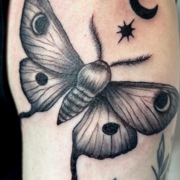 Blackwork insect tattoo